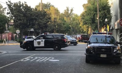 Photo of police cars parked in the street