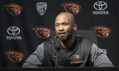 Photo of Cory Hall at news conference talking about being Oregon State interim head coach